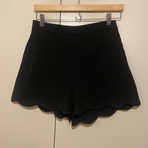 Aritzia high-waist black shorts with scallop bottom